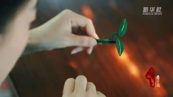 指尖绽放非遗之美——缠花里的中国故事